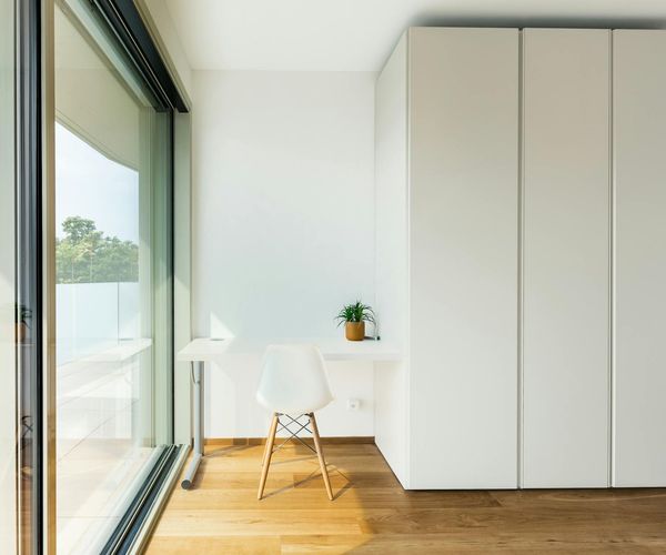 A bright and clean studio space with minimalist decor.
